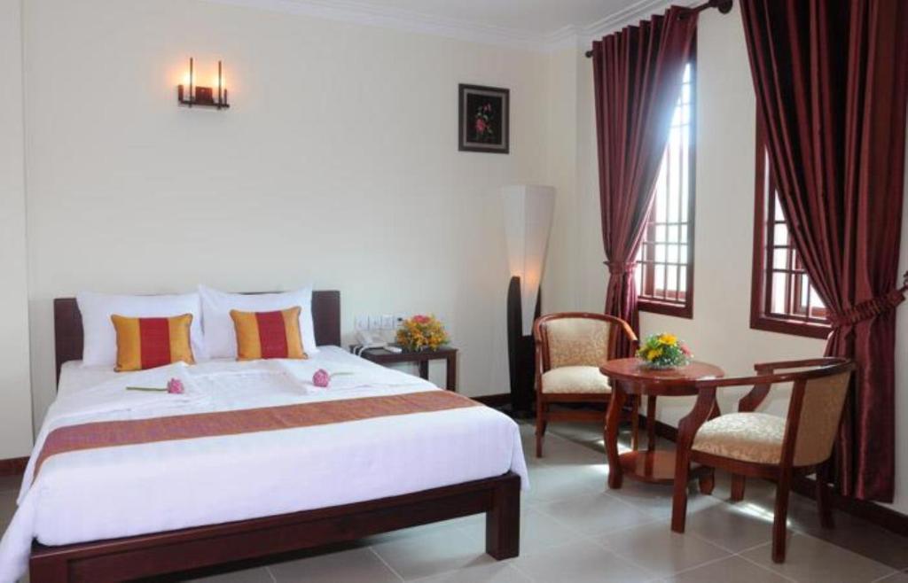V N E Hotel Пном Пен Стая снимка